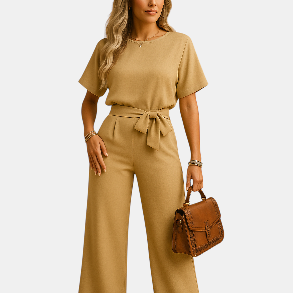 Chique dames jumpsuit in zwart, beige of groen met getailleerde pasvorm en losvallende mouwen, ideaal voor formele en stijlvolle gelegenheden.