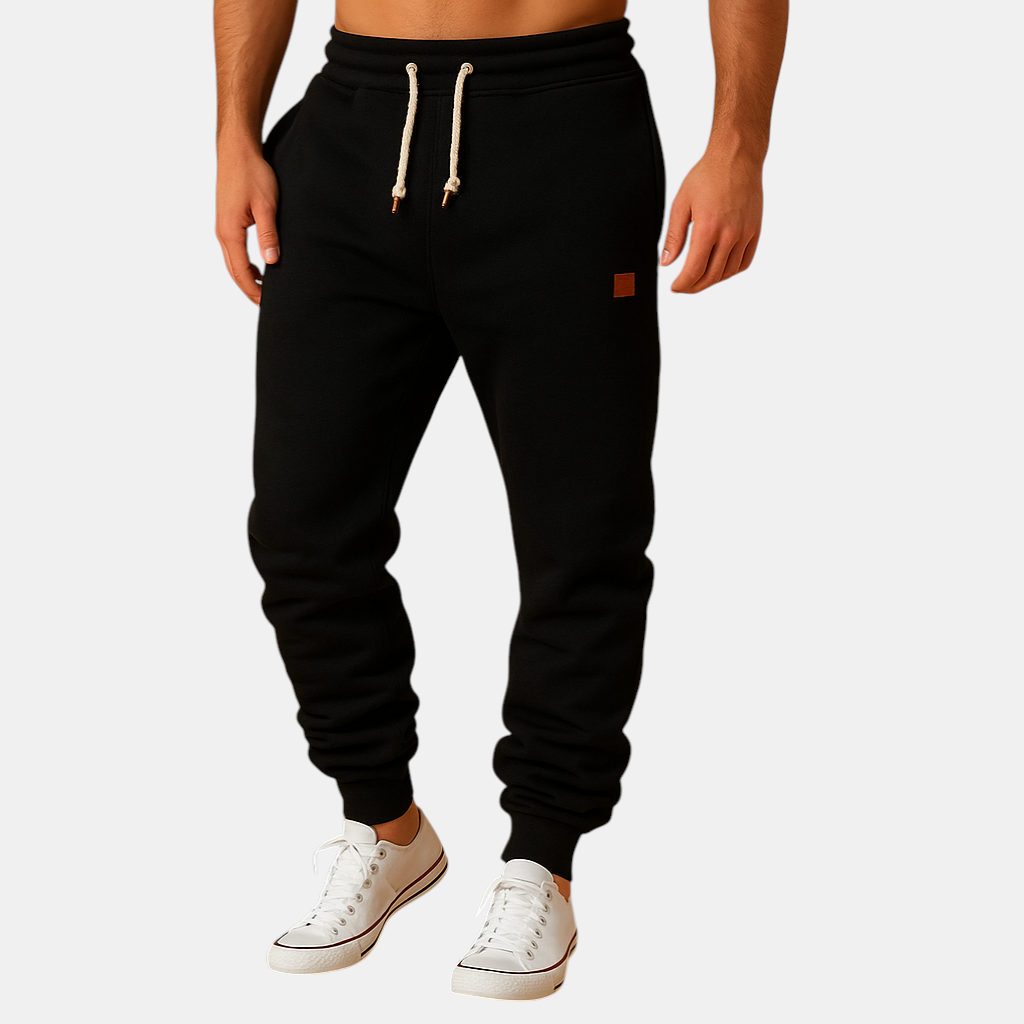 Comfortabele joggingbroek voor heren van katoenmix met verstelbare tailleband en zijzakken, perfect voor sport of ontspanning.