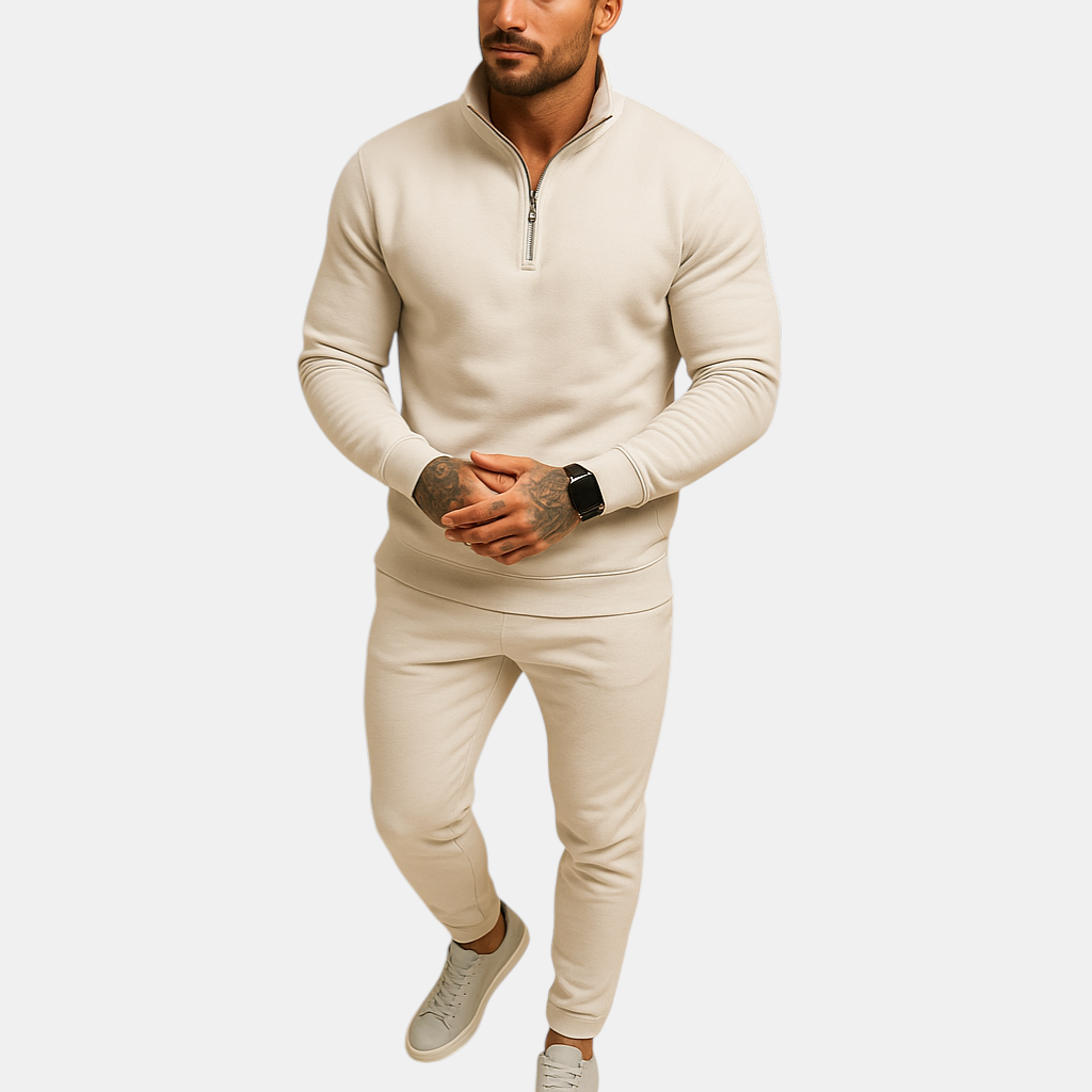 Joggingpak voor heren met halve rits trui en joggingbroek, beschikbaar in zwart, grijs, wit en khaki – ideaal voor thuis of onderweg.