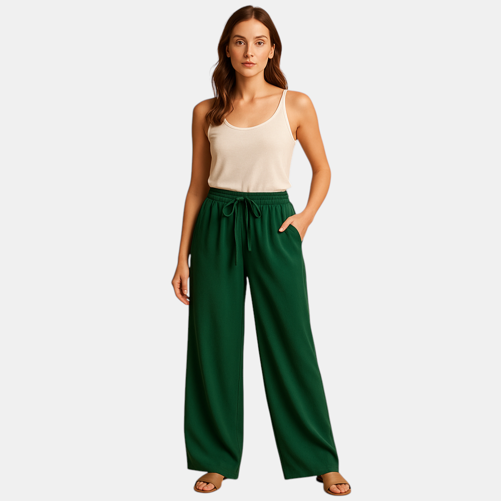 Luchtige damesbroek met elastische tailleband en losse pasvorm, geschikt voor zomerse casual of chique outfits.