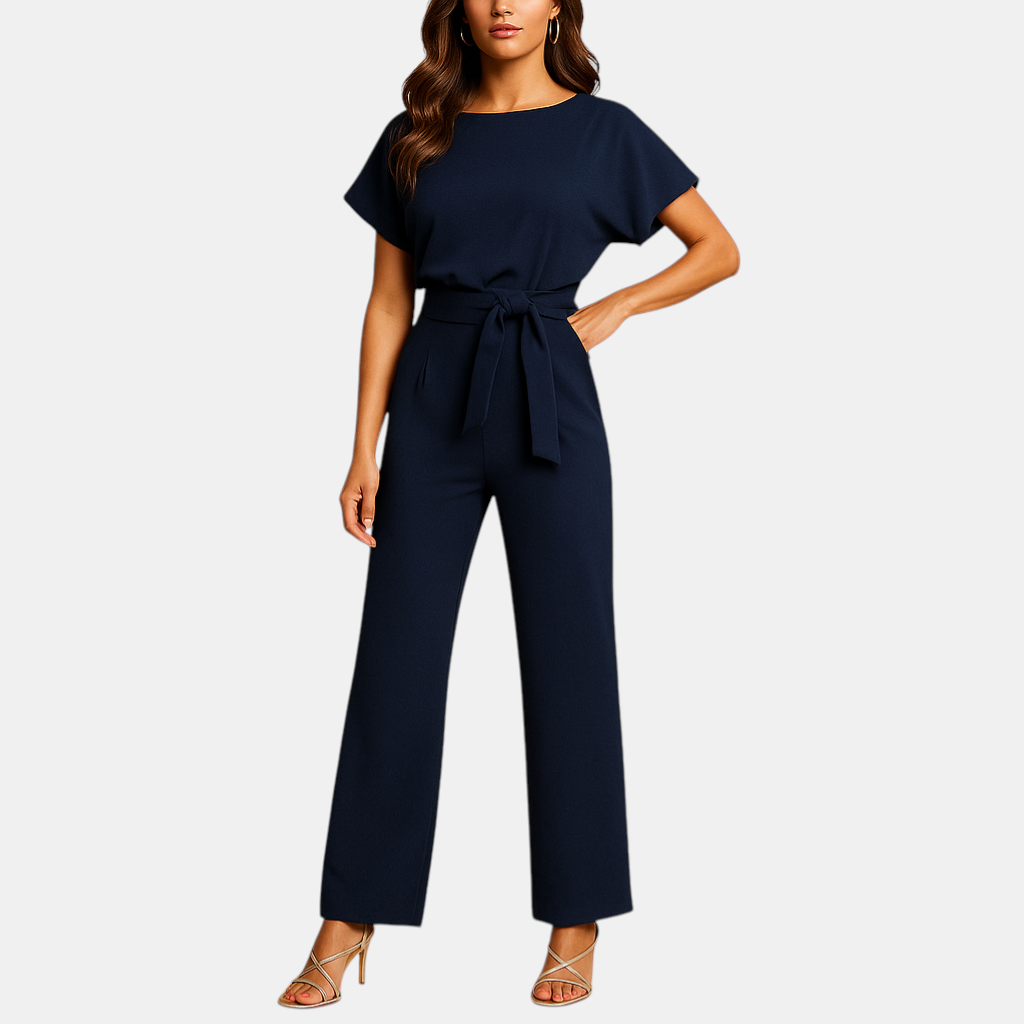 Getailleerde dames jumpsuit met hoge taille en vrouwelijk veterdetail, ideaal voor werk, avondjes uit en casual chique outfits.