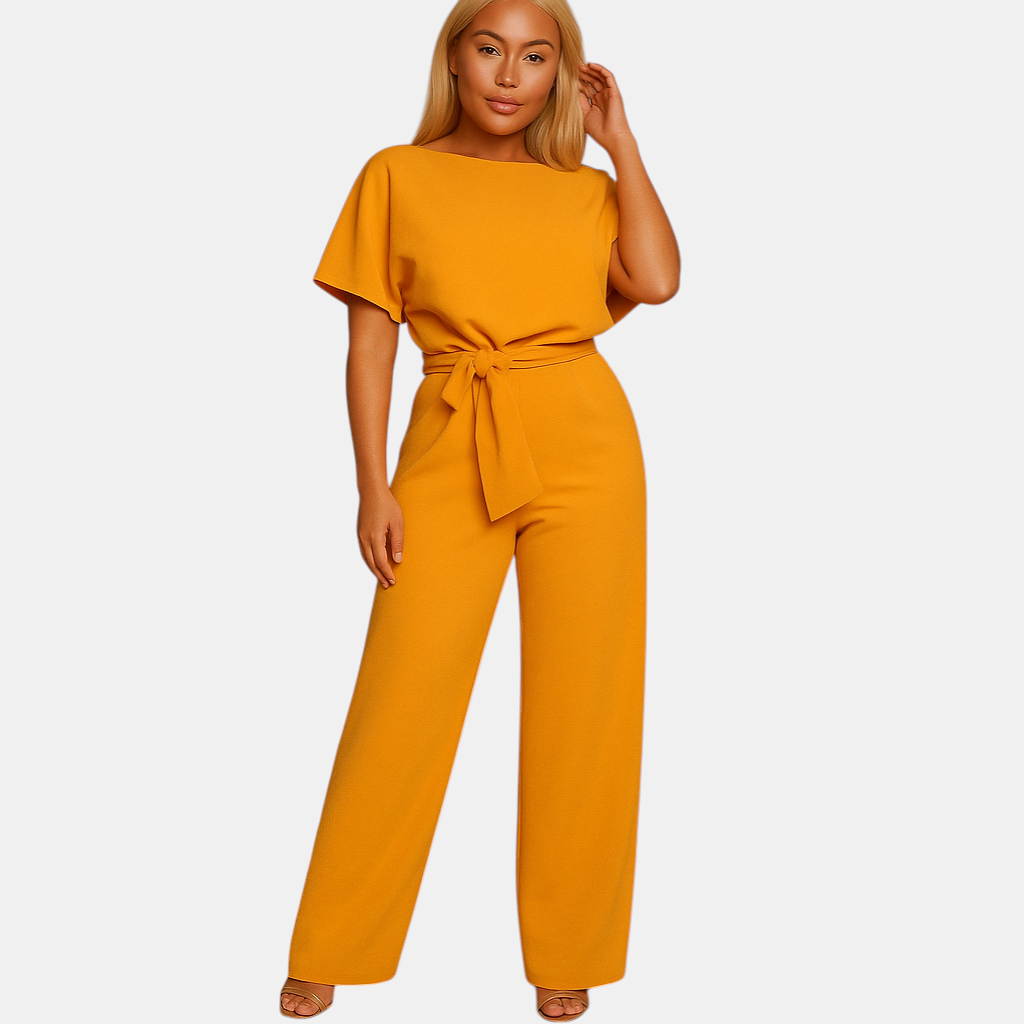 Getailleerde dames jumpsuit met hoge taille en vrouwelijk veterdetail, ideaal voor werk, avondjes uit en casual chique outfits.