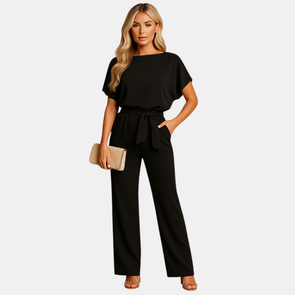 Getailleerde dames jumpsuit met hoge taille en vrouwelijk veterdetail, ideaal voor werk, avondjes uit en casual chique outfits.