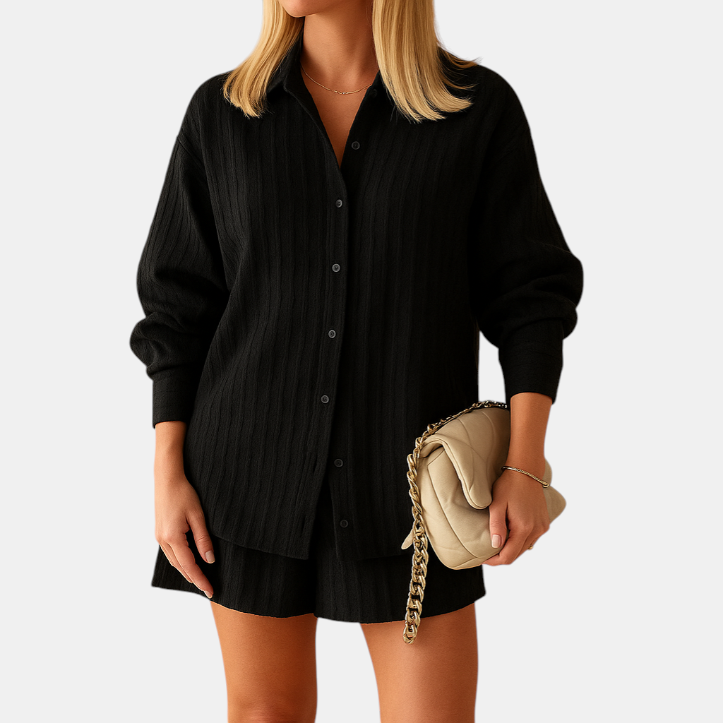 Elegant summer outfit featuring a lightweight blouse and shorts, perfect for beach or casual occasions