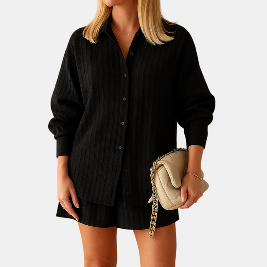 Elegant summer outfit featuring a lightweight blouse and shorts, perfect for beach or casual occasions
