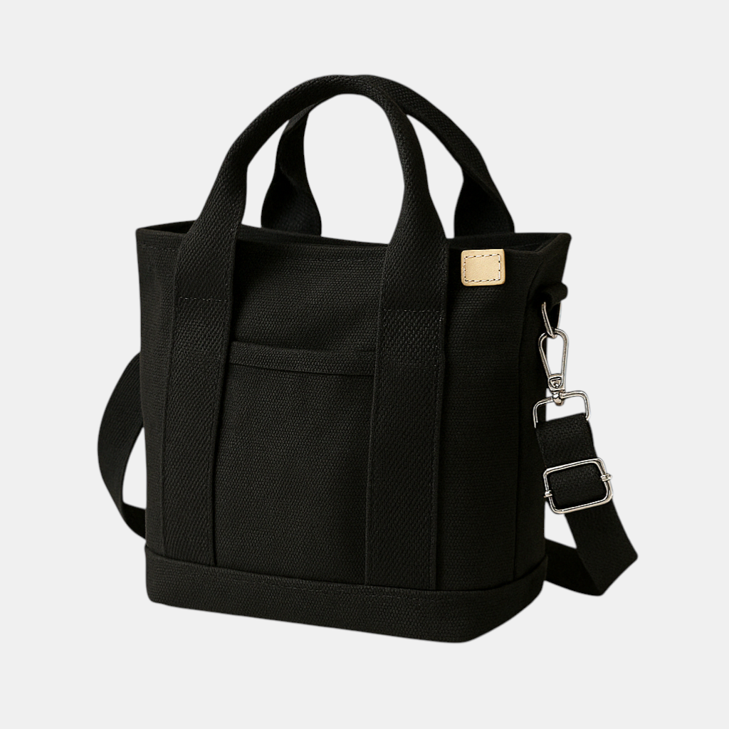 Vrouwelijke schoudertas met meerdere organiserende vakken voor een luxe look.