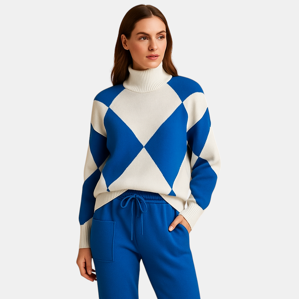 Comfortabel damespak met trui en joggingbroek in ademende stof, ideaal als huispak of casual outfit voor buiten.