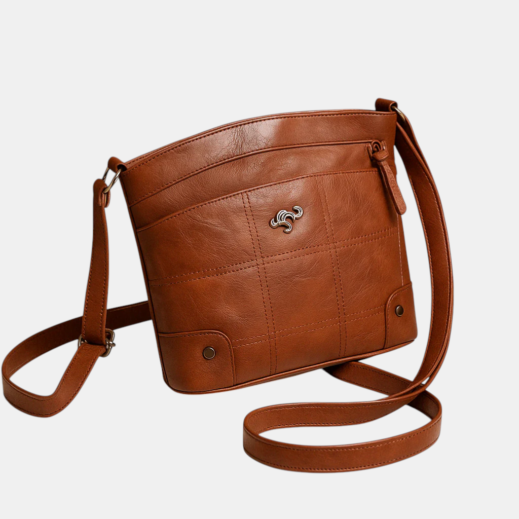 Dames schoudertas met effen kleur, compact ontwerp en elegante afwerking. Ideaal voor dagelijks gebruik of een avondje uit.