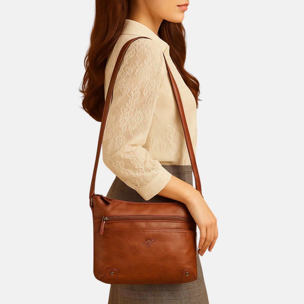 Dames schoudertas met effen kleur, compact ontwerp en elegante afwerking. Ideaal voor dagelijks gebruik of een avondje uit.