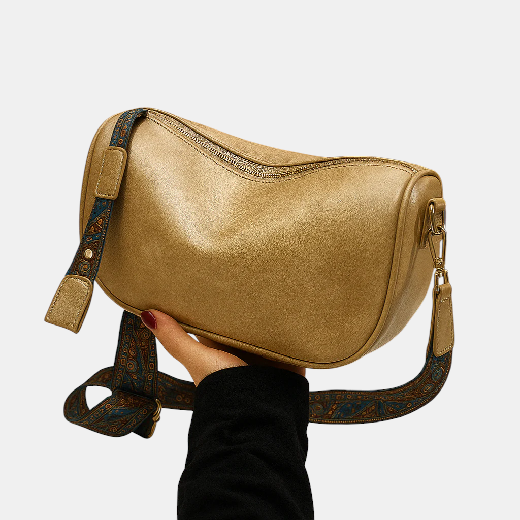 Crossbodytas voor dames met gestructureerde vorm, tijdloos ontwerp en praktisch interieur, geschikt voor werk, dagelijks gebruik of formele gelegenheden.