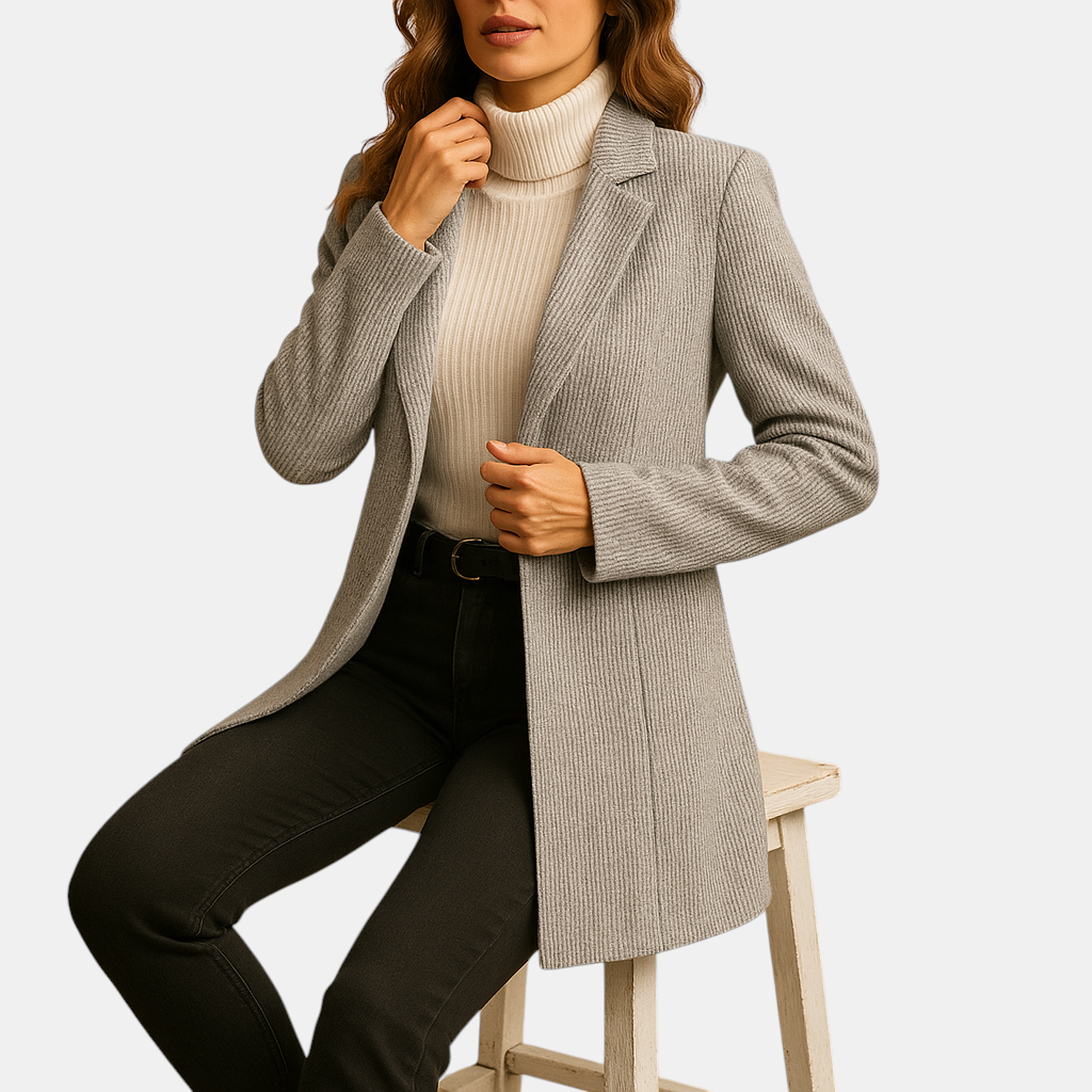 Elegante getailleerde damesblazer met lange mouwen, ideaal voor zakelijke bijeenkomsten of formele gelegenheden.