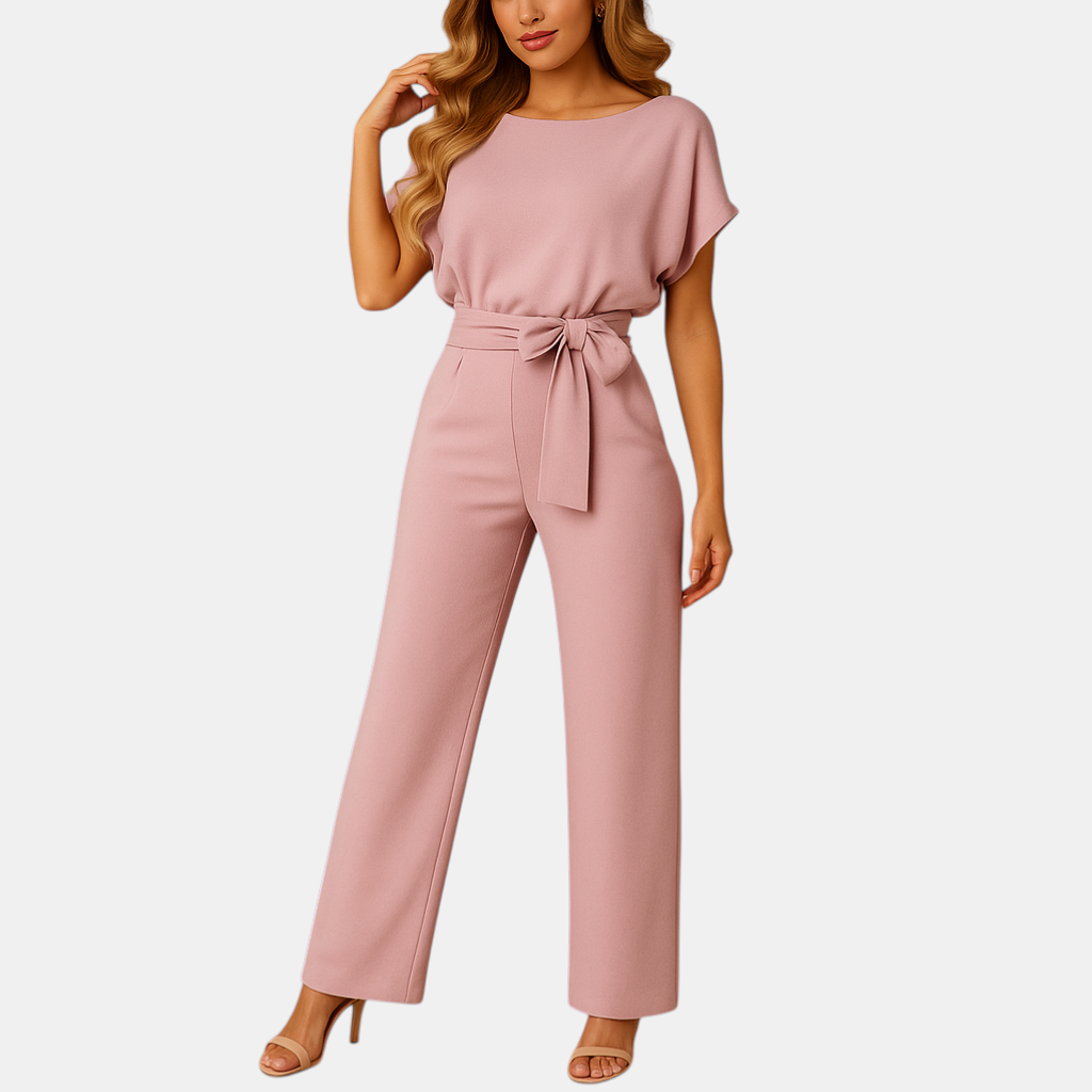 Dames jumpsuit met halternek, open rug en glitterstof – ideaal voor feestjes, gala’s en elegante gelegenheden.