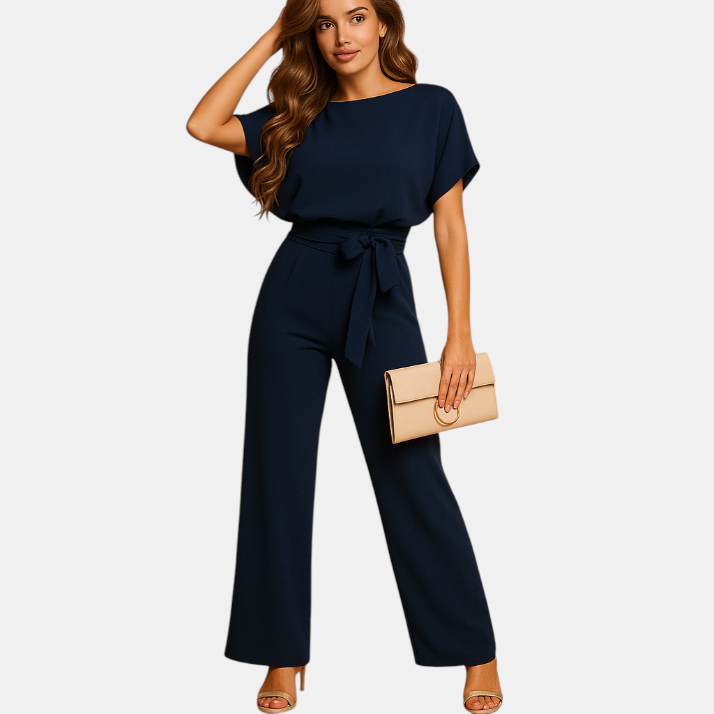 Dames jumpsuit met halternek, open rug en glitterstof – ideaal voor feestjes, gala’s en elegante gelegenheden.