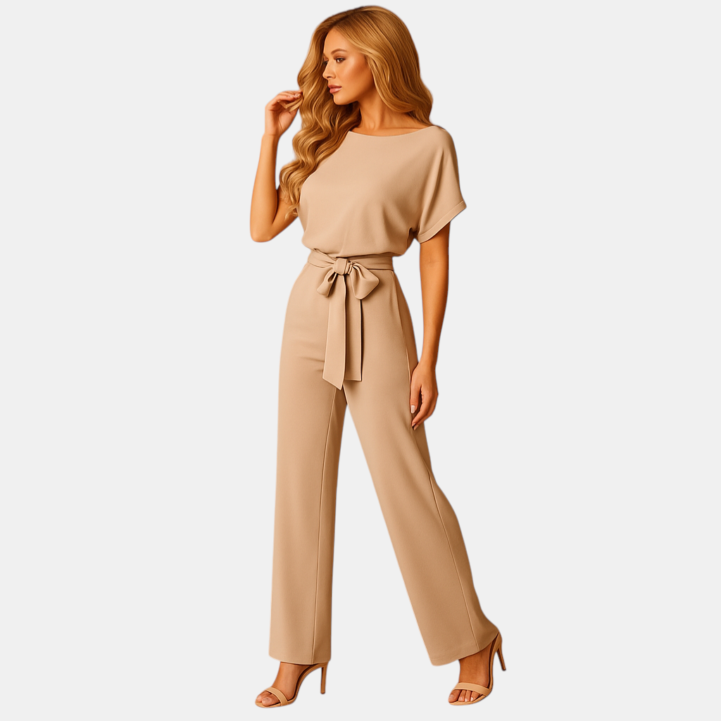 Dames jumpsuit met halternek, open rug en glitterstof – ideaal voor feestjes, gala’s en elegante gelegenheden.