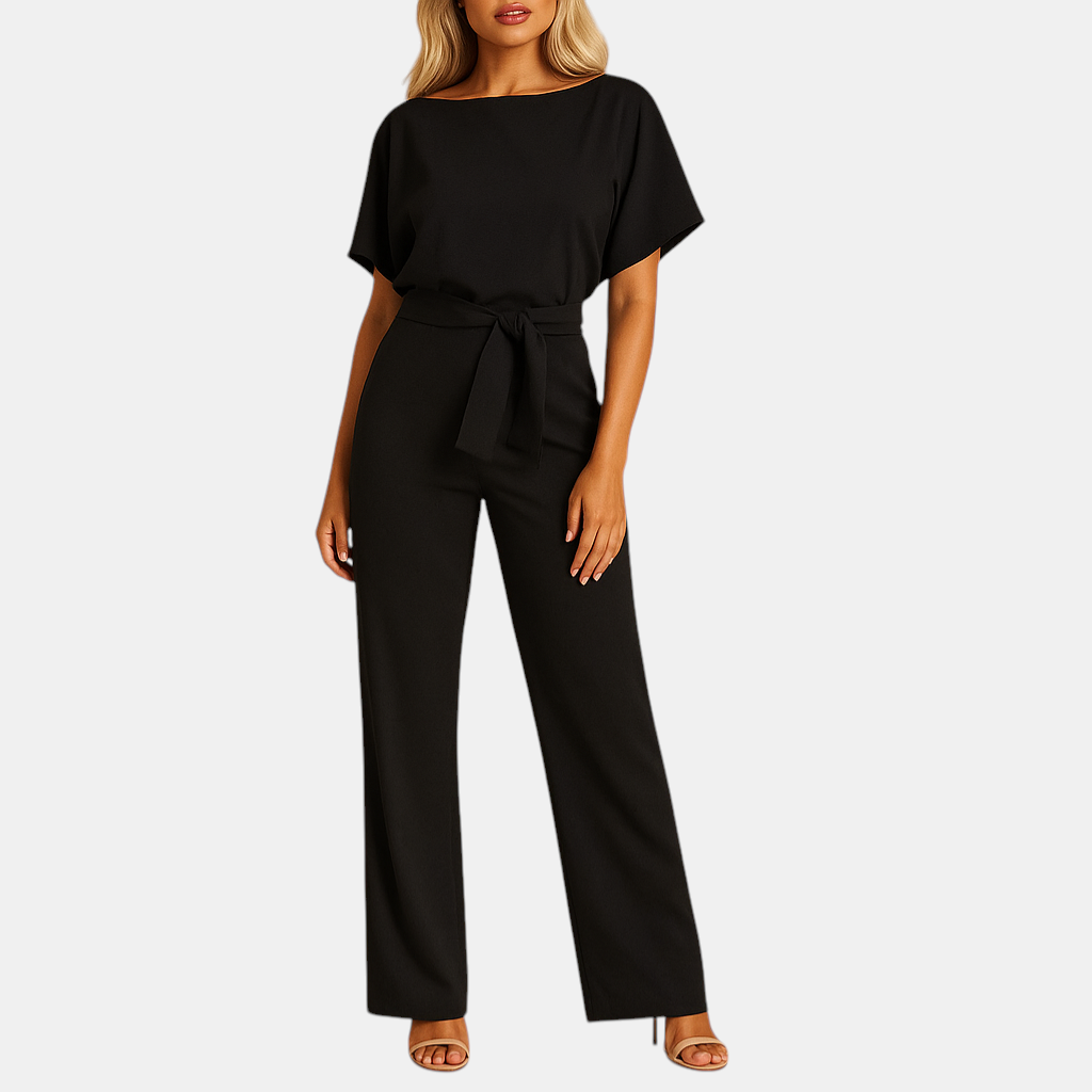 Dames jumpsuit met halternek, open rug en glitterstof – ideaal voor feestjes, gala’s en elegante gelegenheden.