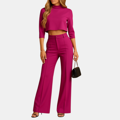 Elegant autumn ensemble for women featuring a cropped top and tailored trousers made from plush, high-quality materials ideal