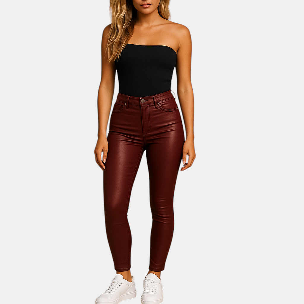 Damesbroek met hoge taille en slim fit pasvorm, gemaakt van rekbaar materiaal voor een flatterend en stijlvol silhouet.
