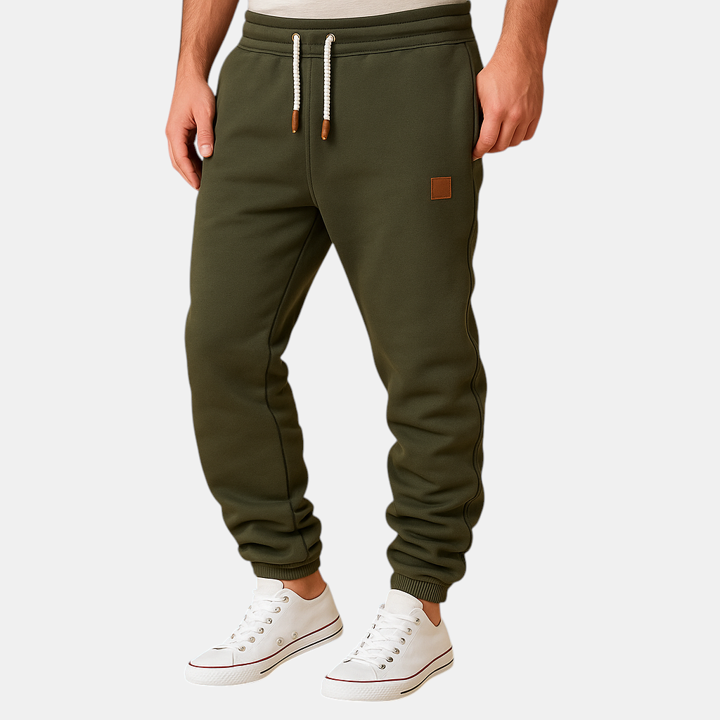 Comfortabele joggingbroek voor heren van katoenmix met verstelbare tailleband en zijzakken, perfect voor sport of ontspanning.