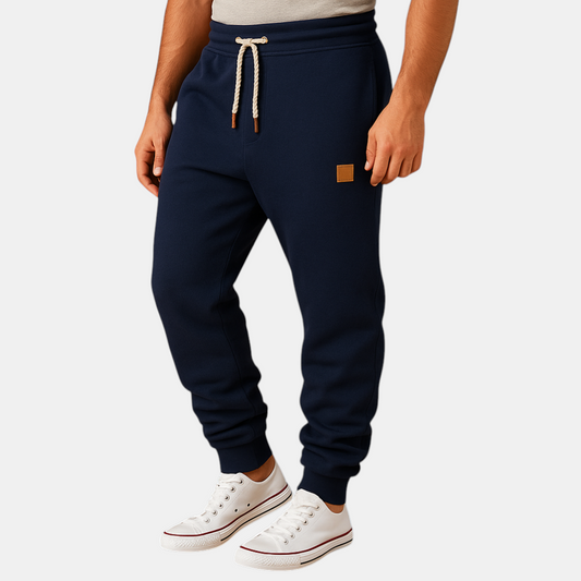 Comfortabele joggingbroek voor heren van katoenmix met verstelbare tailleband en zijzakken, perfect voor sport of ontspanning.