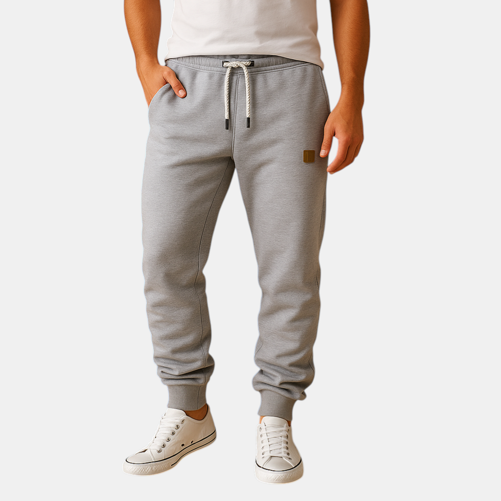 Comfortabele joggingbroek voor heren van katoenmix met verstelbare tailleband en zijzakken, perfect voor sport of ontspanning.