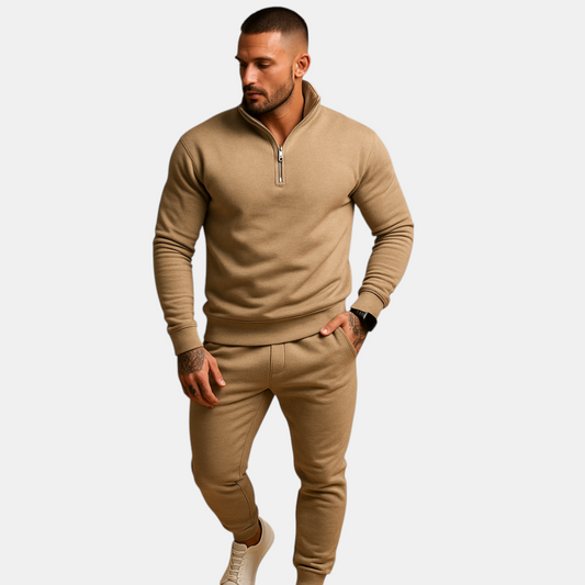 Joggingpak voor heren met halve rits trui en joggingbroek, beschikbaar in zwart, grijs, wit en khaki – ideaal voor thuis of onderweg.