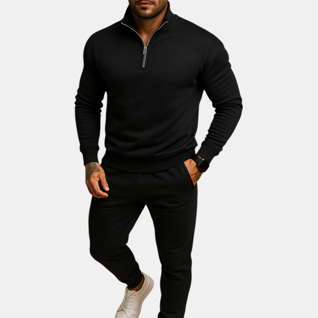 Joggingpak voor heren met halve rits trui en joggingbroek, beschikbaar in zwart, grijs, wit en khaki – ideaal voor thuis of onderweg.
