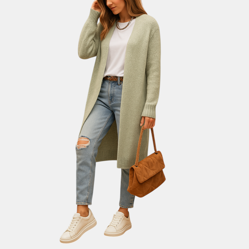 Klassiek gebreid damesvest met open voorkant en lange mouwen. Zacht, warm en perfect voor winter en tussenseizoenen in meerdere kleuren.