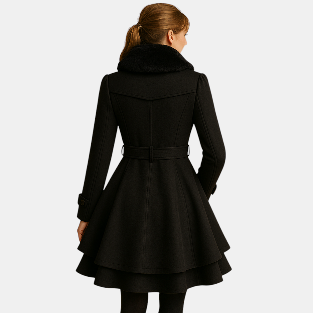 Lange winterjas voor dames met imitatiebont kraag en flatterend silhouet. Warm, stijlvol en ideaal voor dagelijks gebruik en bijzondere gelegenheden.