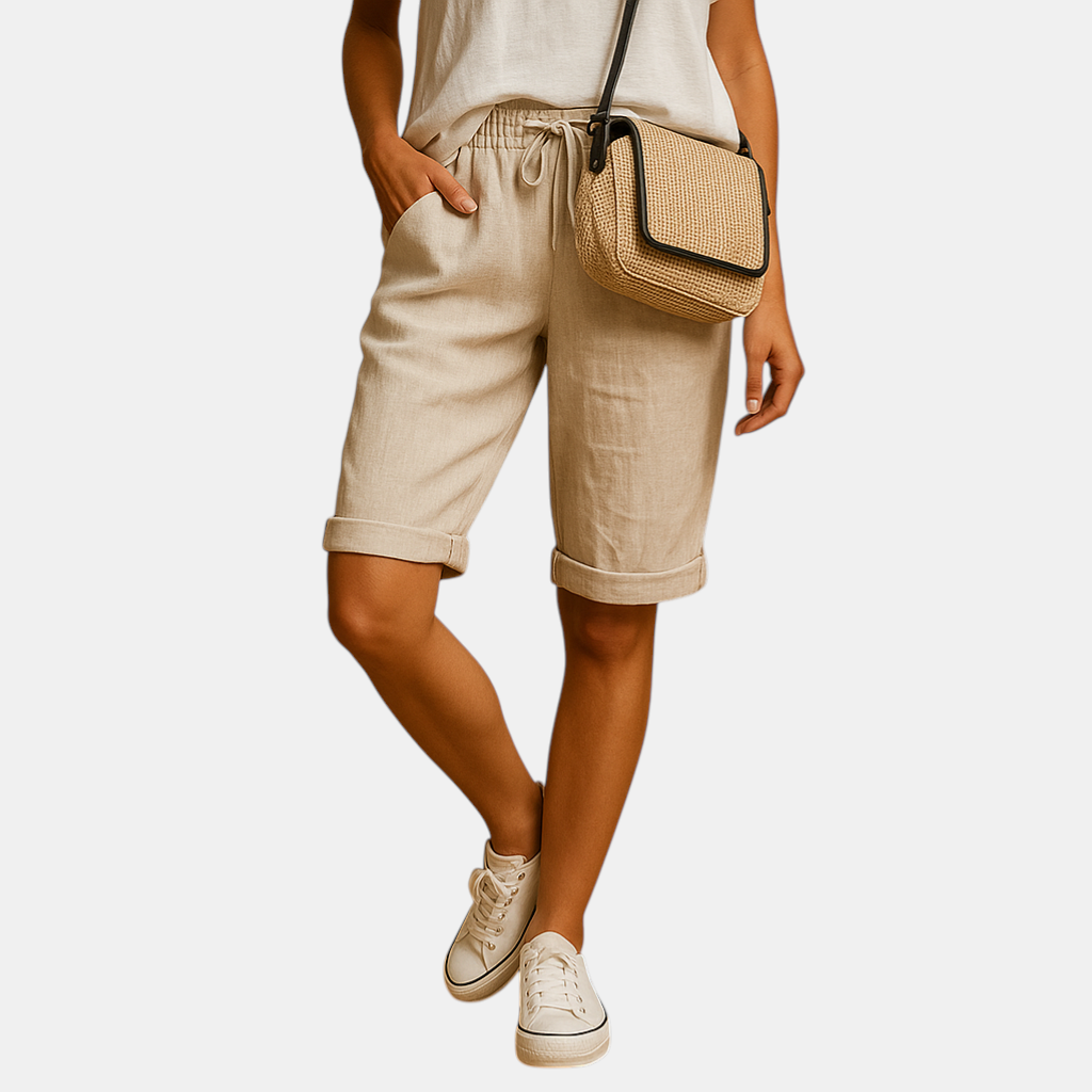 Dames capribroek met elastische taille en strikkoord, relaxed fit en opgerolde zoom, ideaal voor lente- en zomerdagen.