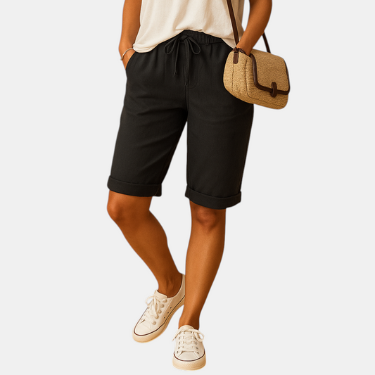 Dames capribroek met elastische taille en strikkoord, relaxed fit en opgerolde zoom, ideaal voor lente- en zomerdagen.