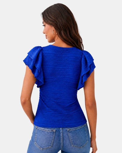 Luxen-Amsterdam Noor Ruffle Blouse in kobaltblauw met geplooide textuur en ruches op de mouwen.