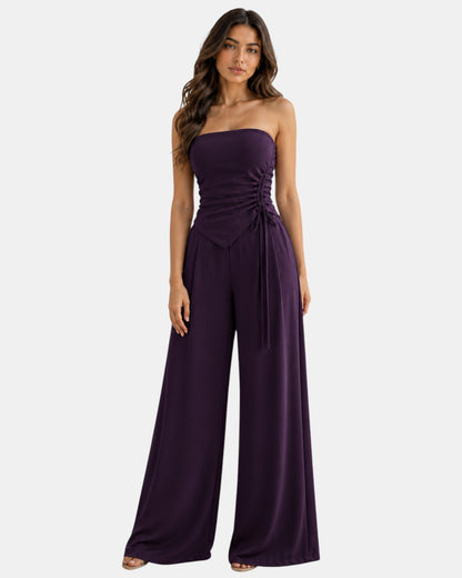Luxen-Amsterdam paarse strapless top met ruches en wijde pijpen broek, verstelbaar strikdetail, elegante zomerse outfit.