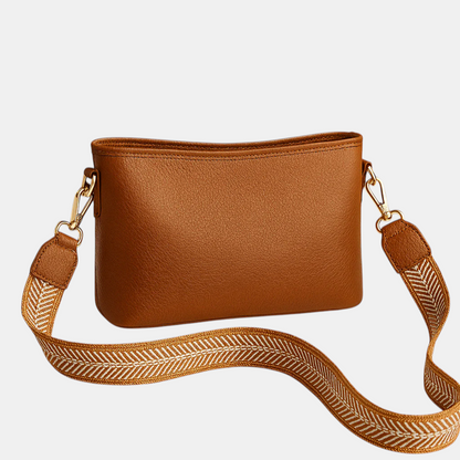 Sling bag voor dames met modern ontwerp, verstelbare riem en ruim hoofdvak, perfect voor werk, school of dagelijks gebruik.