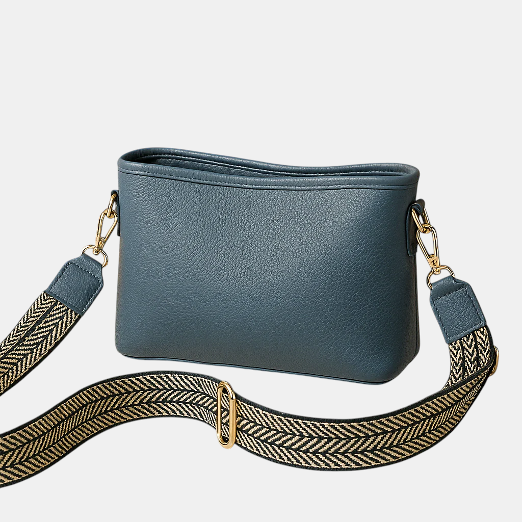 Sling bag voor dames met modern ontwerp, verstelbare riem en ruim hoofdvak, perfect voor werk, school of dagelijks gebruik.