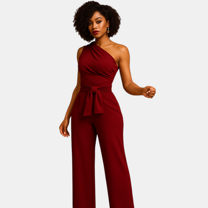 Elegante one-shoulder dames jumpsuit in rood of zwart met wijde broekspijpen, perfect voor zomerfeesten of speciale gelegenheden.
