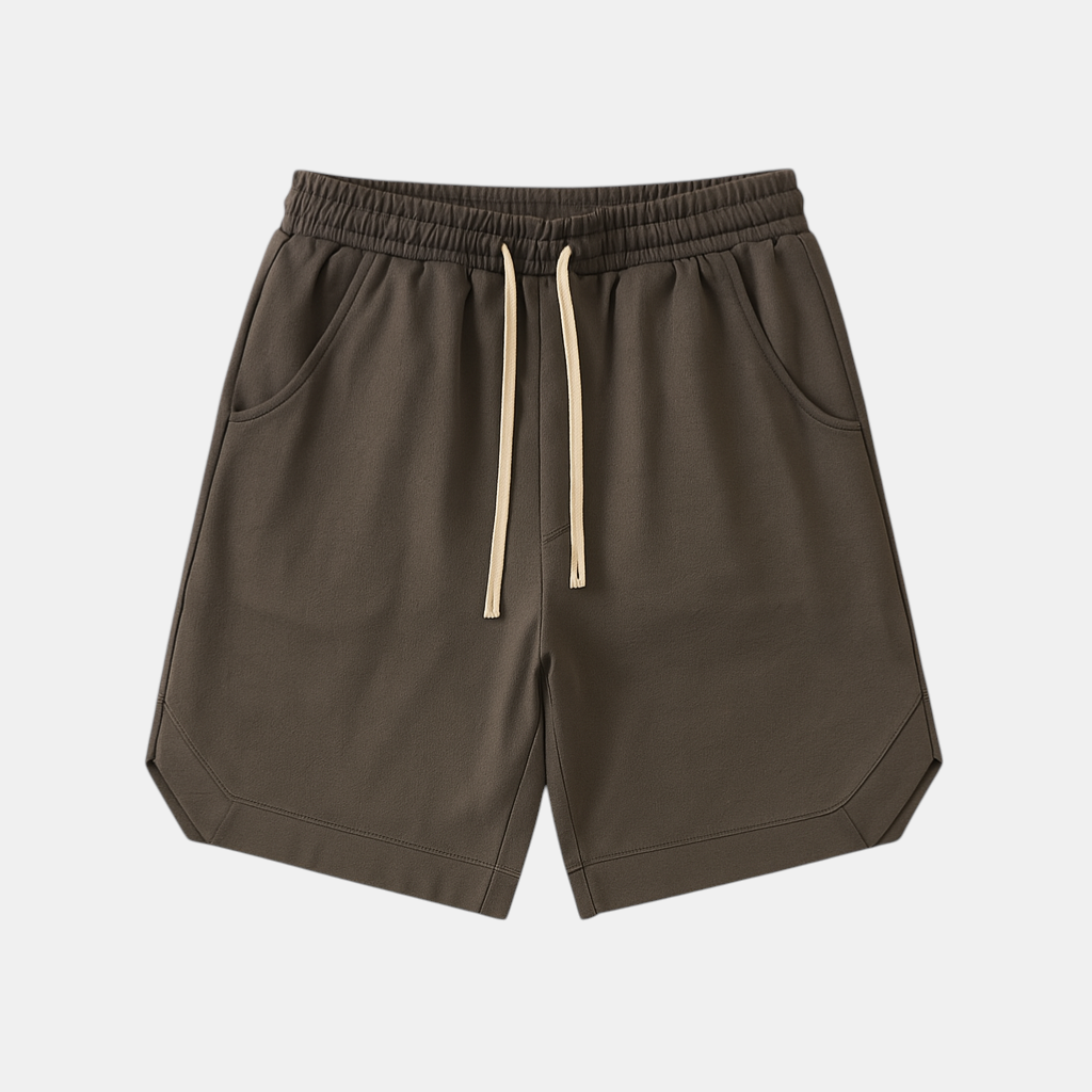 Retro sportshort voor heren met losse pasvorm en elastische tailleband, perfect voor sportieve activiteiten en ontspannen zomerdagen.