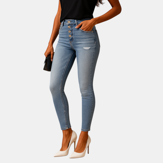 Dames slim fit jeans met ripped details, gemaakt van denim in een comfortabele stretchstof, perfect voor casual en trendy looks.