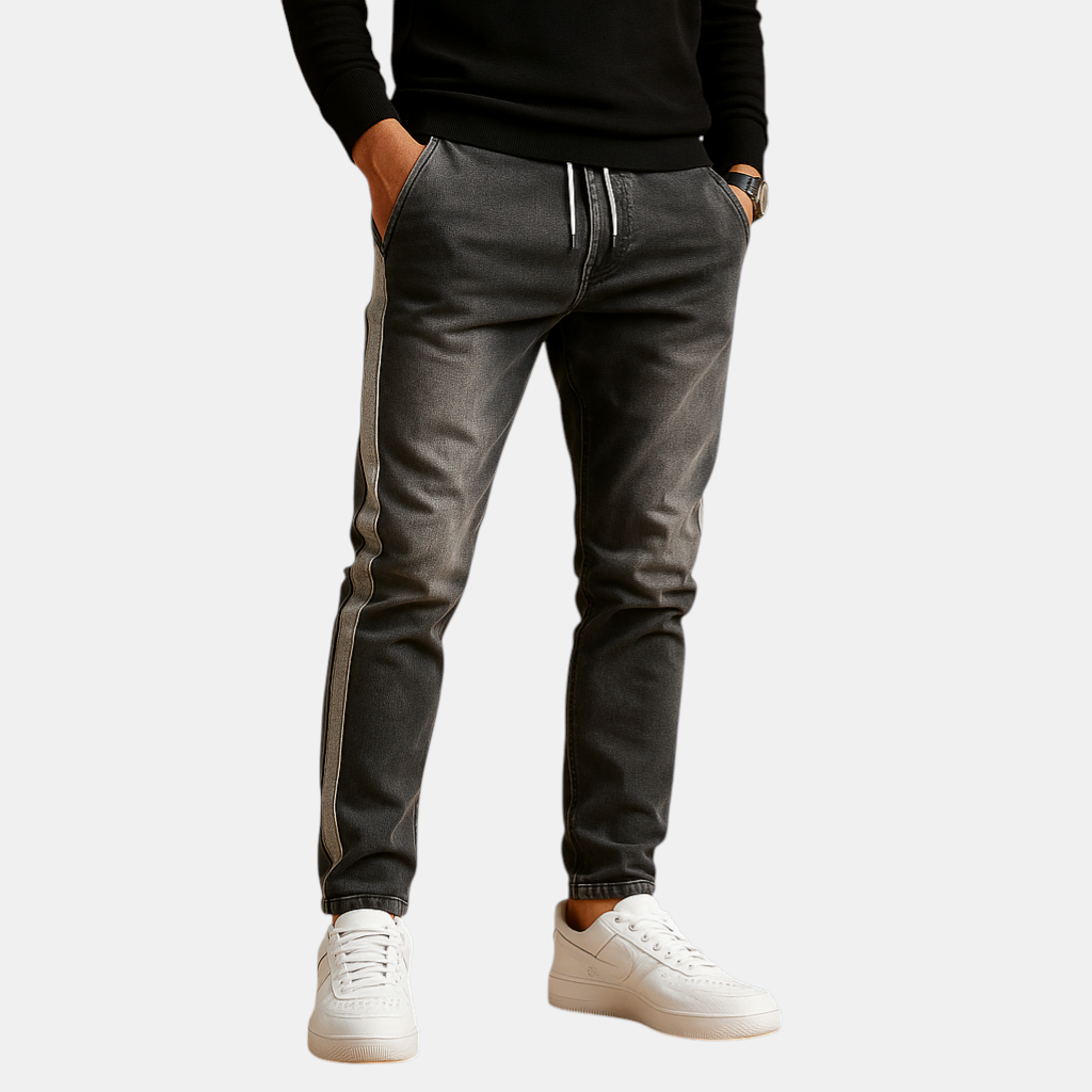 Slim-fit herenjeans met stretch denim en moderne wassing, ideaal voor casual en smart-casual outfits met comfortabele pasvorm.