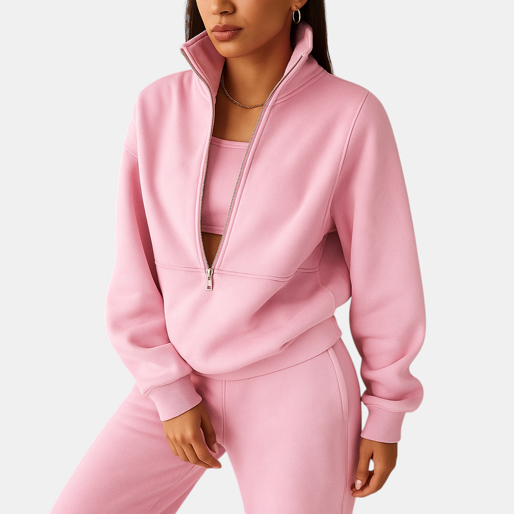 Tweedelig joggingpak voor dames met vest en halve rits in roze, groen of blauw – ideaal voor loungen of sportieve dagen.