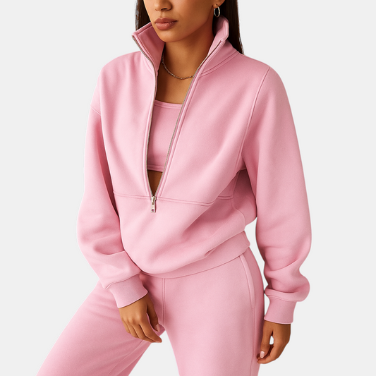 Tweedelig joggingpak voor dames met vest en halve rits in roze, groen of blauw – ideaal voor loungen of sportieve dagen.
