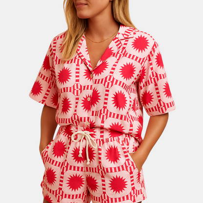 Luxurious summer dress with floral print and elastic waistband, perfect for beach, city, or casual outings